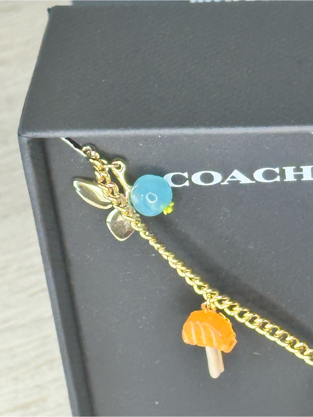 Coach Gold-Tone Charm Necklace with Mushroom Star - Picture 6 of 7